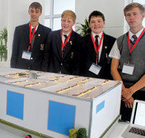 The winning team, St Johns, proudly demonstrates its project, which includes a fully functional closed loop pool pump.